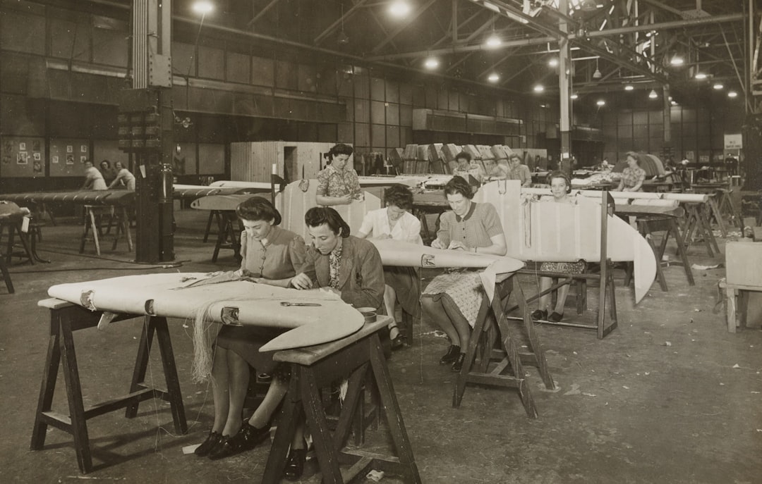 factory workers checking product quality