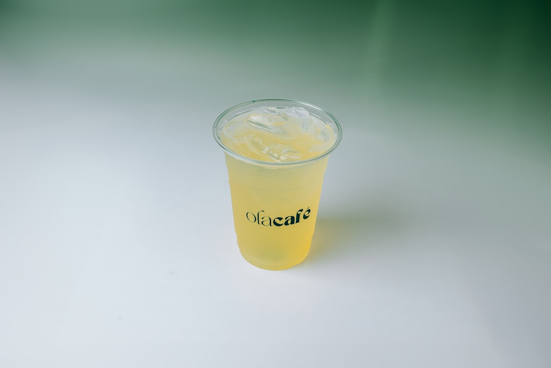 homemade drink served in glass with ingredients around